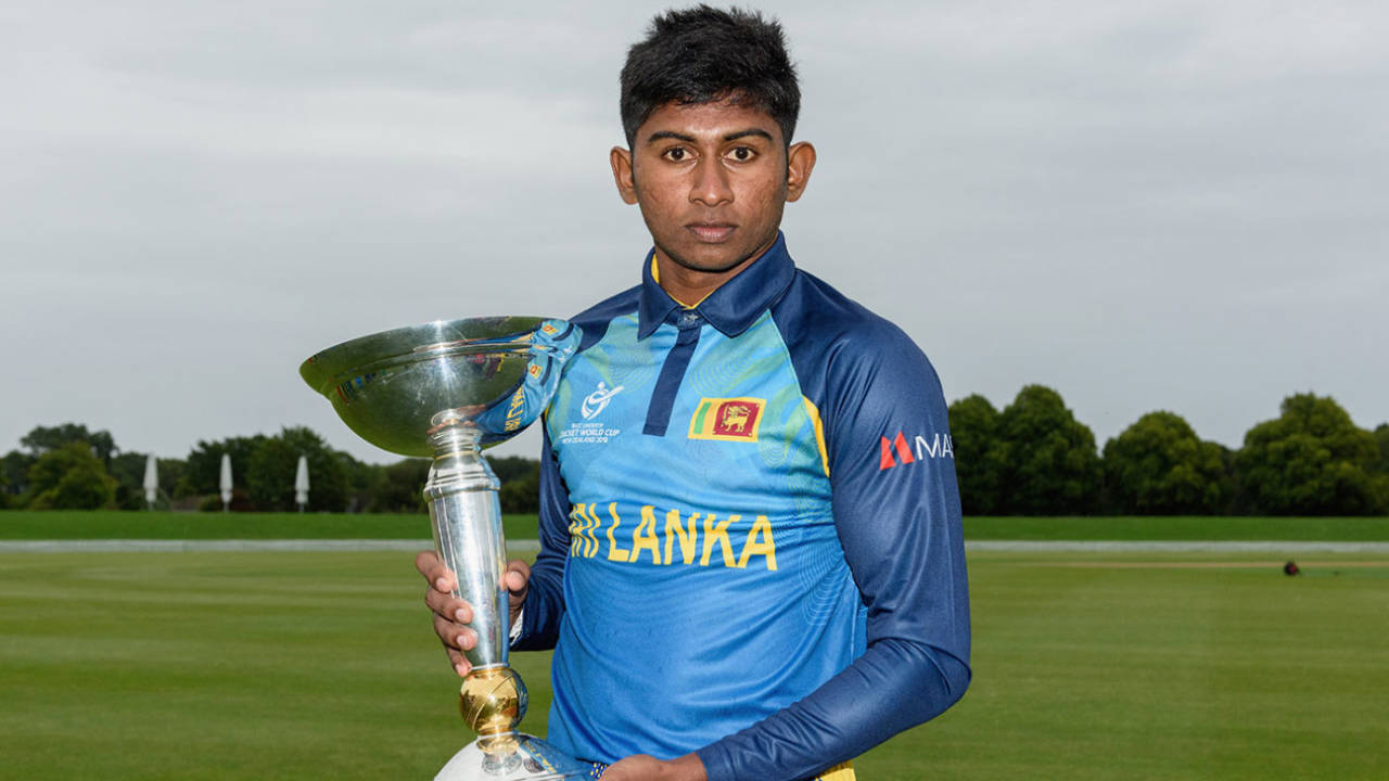 Kamindu Mendis holds the Under-19 World Cup trophy, Christchurch, January 7, 2018