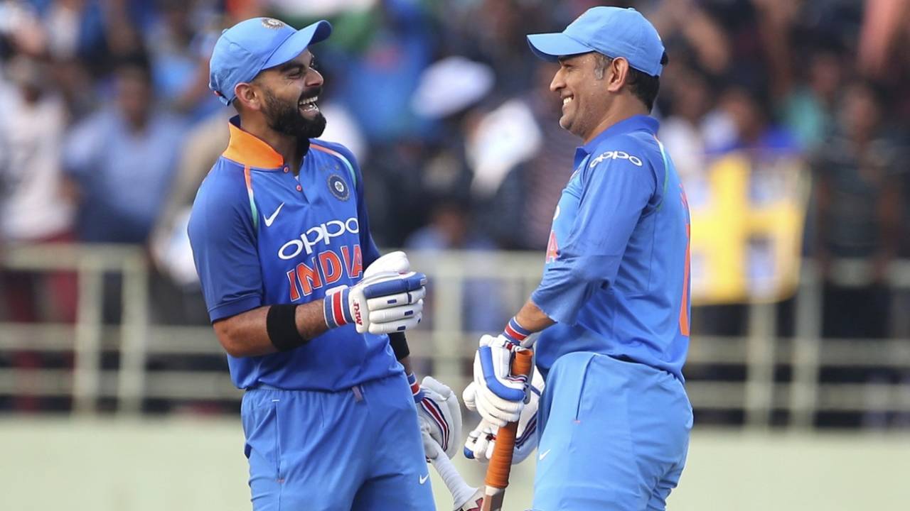 Virat Kohli and MS Dhoni meet mid-pitch while the ball is retrieved from the stands, India v West Indies, 2nd ODI, Visakhapatnam, October 24, 2018