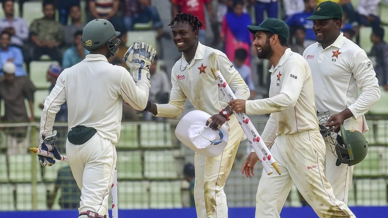 Brandon Mavuta, Sikandar Raza and Hamilton Masakadza are all smiles following Zimbabwe's first overseas Test win in 17 years, Bangladesh v Zimbabwe, 1st Test, Sylhet, 4th day, November 6, 2018