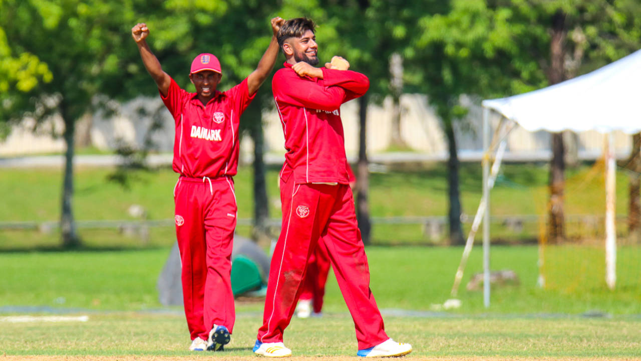 Saif Ahmad signs an 'X' to cross another wicket off his bowling, Denmark v Malaysia, ICC World Cricket League Division Four, Bangi, May 2, 2018