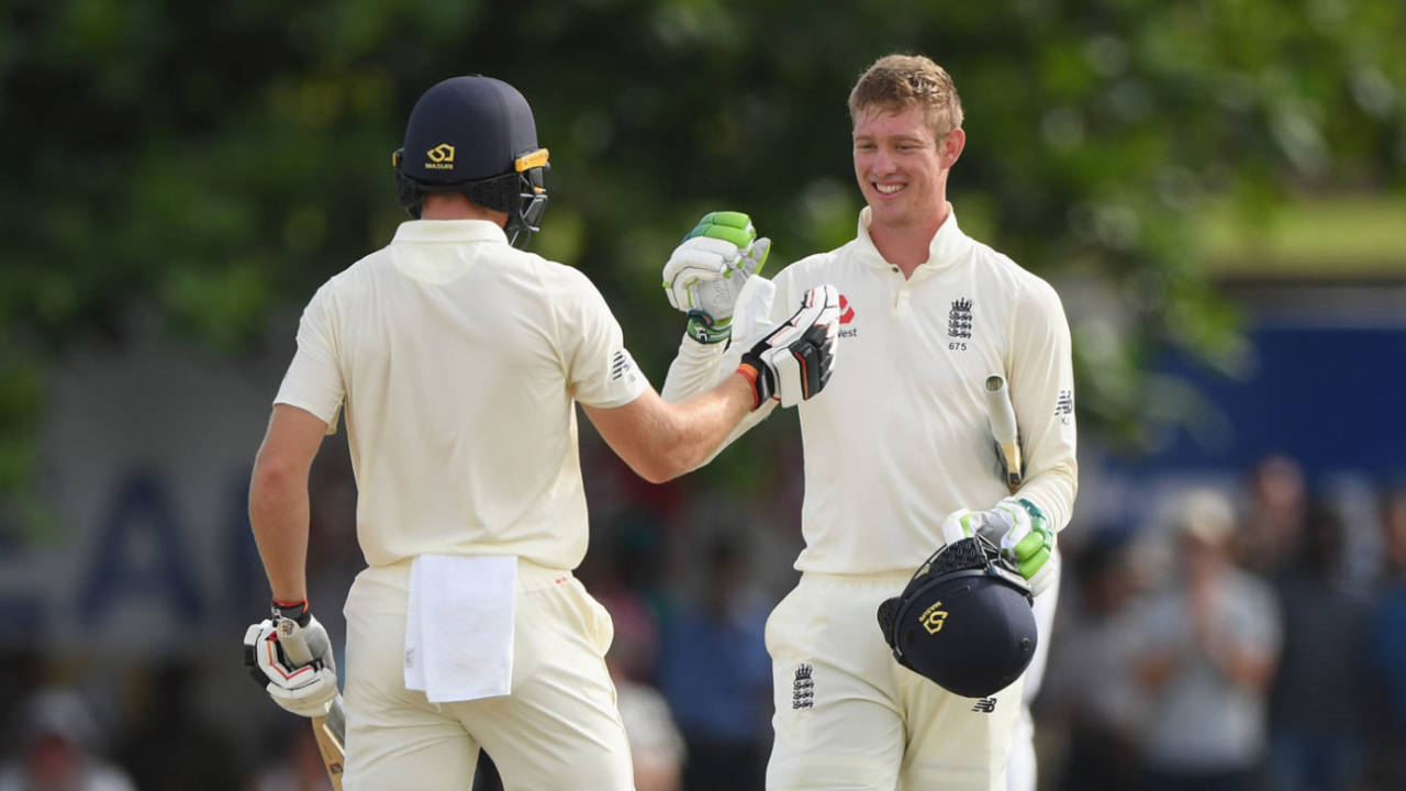 Keaton Jennings is congratulated by Jos Buttler after reaching his second Test hundred, Sri Lanka v England, 1st Test, 3rd day, Galle, November 8, 2018