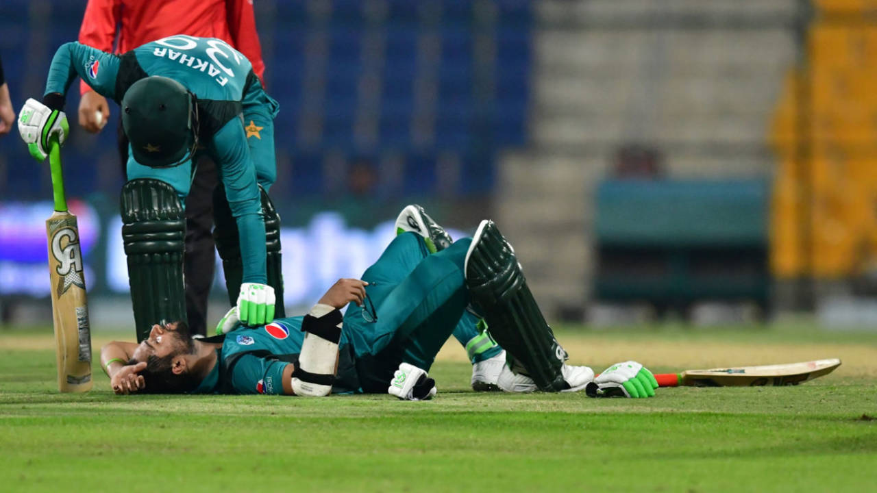 Fakhar Zaman checks on Imam-ul-Haq after he was struck by a bouncer, Pakistan v New Zealand, 2nd ODI, Abu Dhabi, November 9, 2018