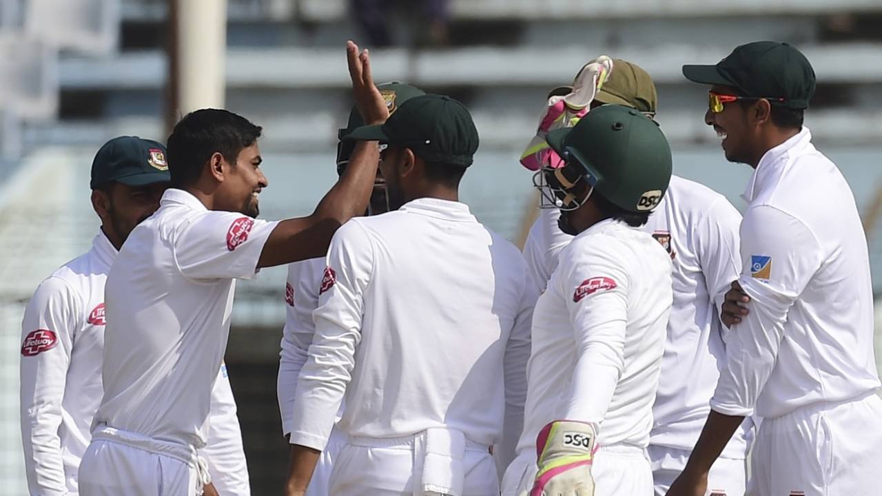 Taijul Islam celebrates with team-mates after a wicket, Bangladesh v West Indies, 1st Test, Chattogram, 3rd day