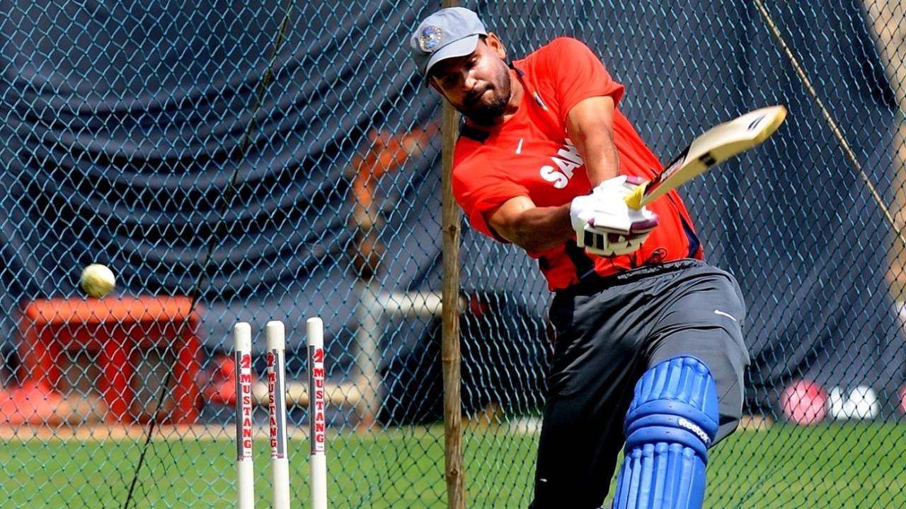 Yusuf Pathan goes for it in the nets during a training session at The M Chinnaswamy Stadium in Bangalore, World Cup 2011, February 23, 2011