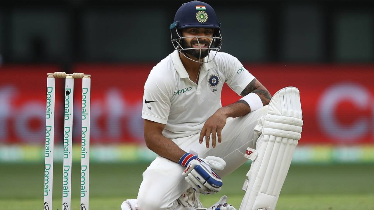 Virat Kohli grimaces after diving and making his ground, Australia v India, 2nd Test, Perth, 2nd day, December 15, 2018