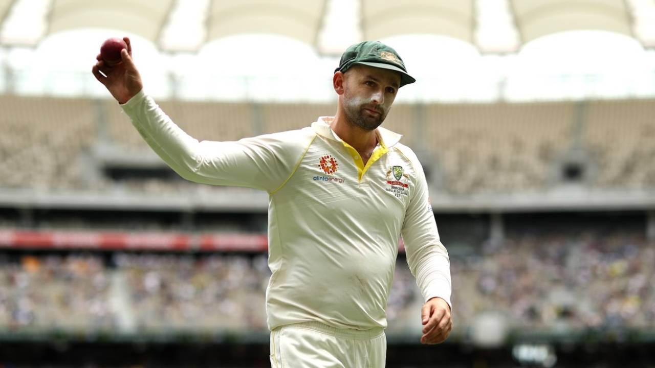 Nathan Lyon raises the ball aloft after claiming his seventh five-for against India&nbsp;&nbsp;&bull;&nbsp;&nbsp;Getty Images