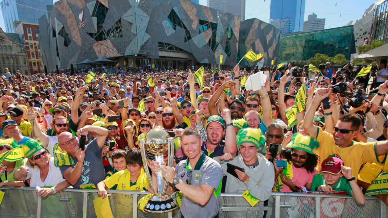 Michael Clarke shows off the World Cup trophy to fans at Federation Square in Melbourne after Australia's fifth win in the tournament&nbsp;&nbsp;&bull;&nbsp;&nbsp;ICC