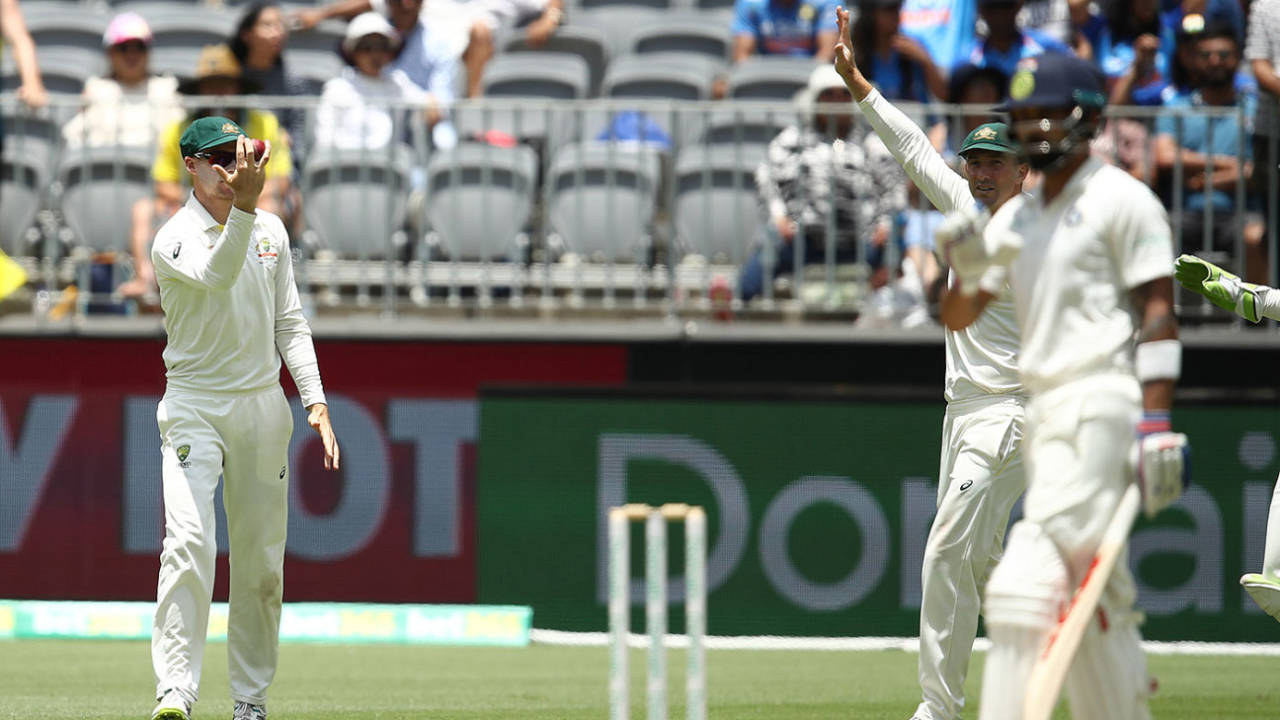 Peter Handscomb signals he got his fingers under the ball to catch Virat Kohli, Australia v India, 2nd Test, Perth, December 16, 2018