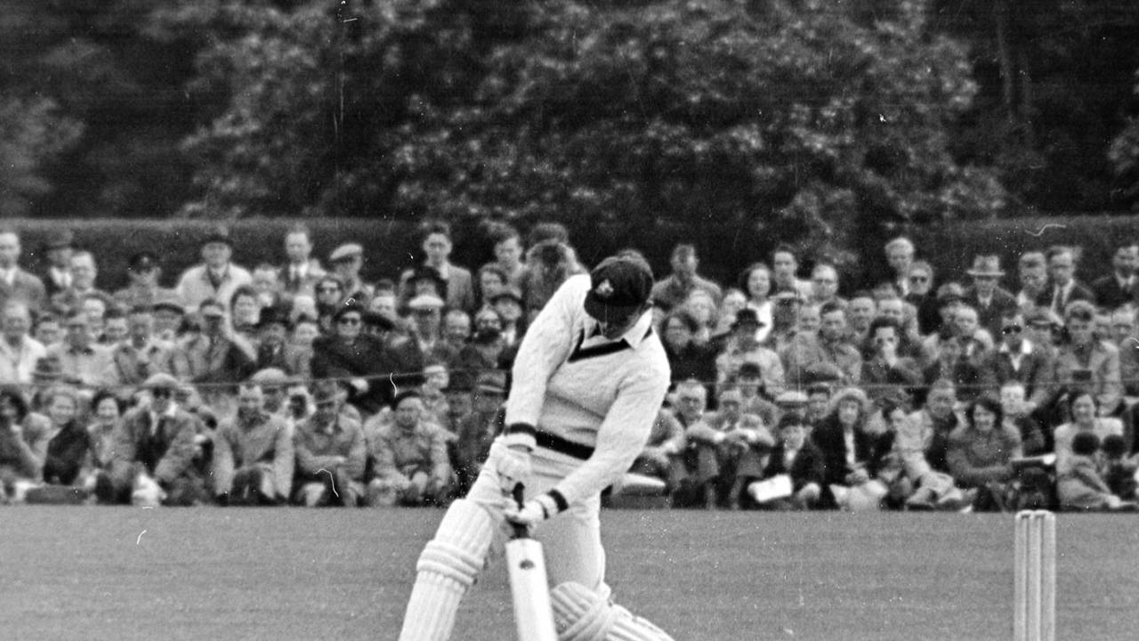 Ernie Toshack looks to hit a six