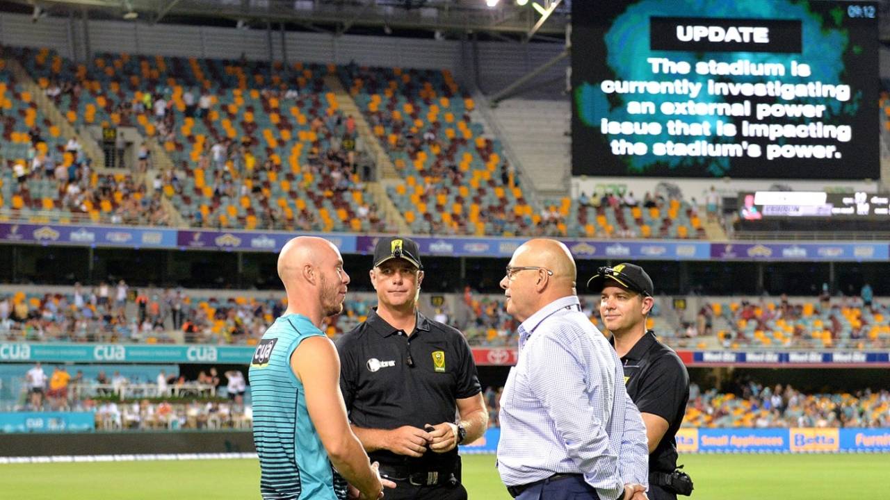 Chris Lynn and match officials have a chat after a power blackout forced the BBL game to be abandoned&nbsp;&nbsp;&bull;&nbsp;&nbsp;Getty Images