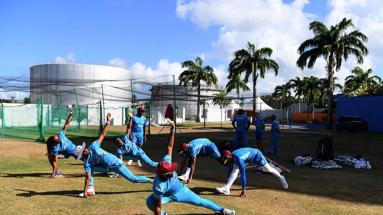 West Indies warm up during training