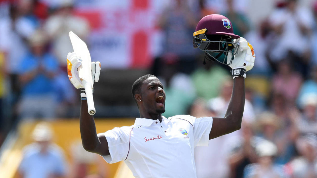 Jason Holder roars in triumph after bringing up his hundred&nbsp;&nbsp;&bull;&nbsp;&nbsp;Getty Images