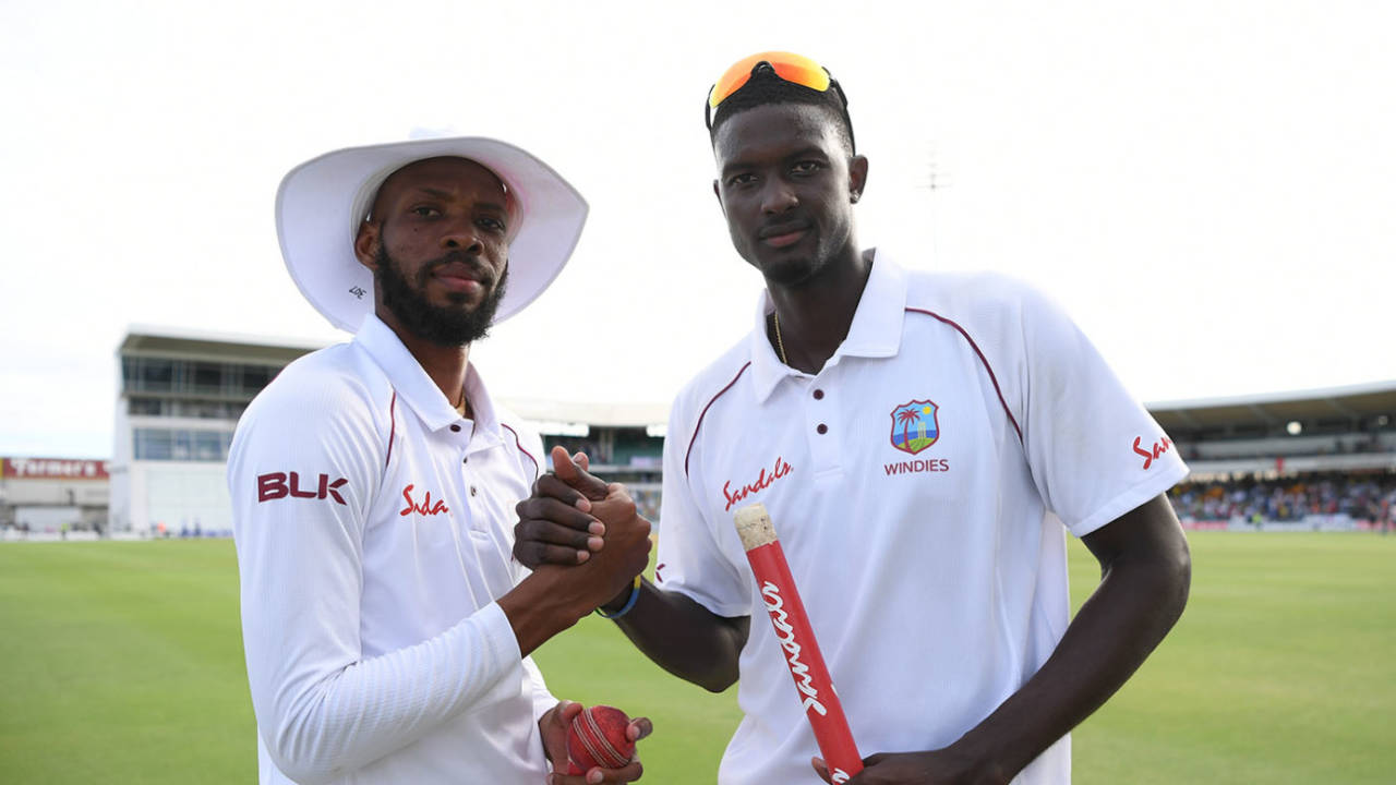 Roston Chase and Jason Holder celebrate West Indies' victory&nbsp;&nbsp;&bull;&nbsp;&nbsp;Getty Images