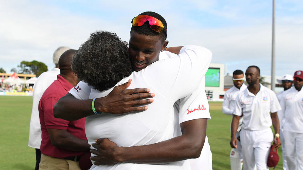 West Indies captain Jason Holder is congratulated by Barbados Prime Minister Mia Mottley&nbsp;&nbsp;&bull;&nbsp;&nbsp;Getty Images