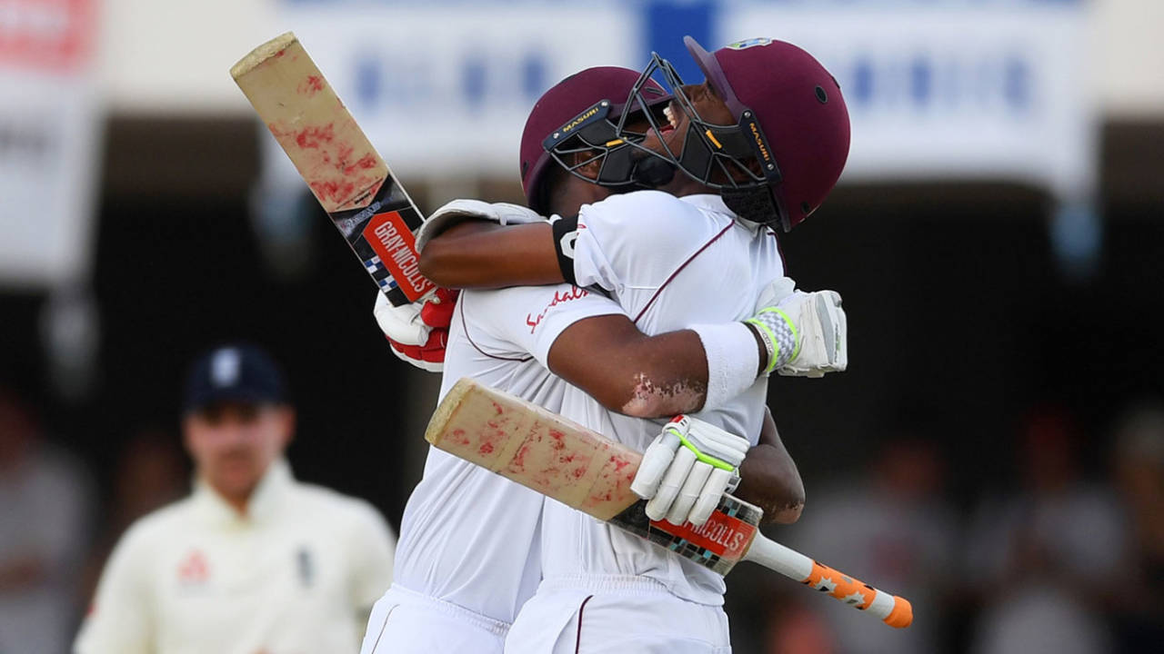 Kraigg Brathwaite and John Campbell celebrate the winning moment, West Indies v England, 2nd Test, 3rd day, Antigua, February 2, 2019