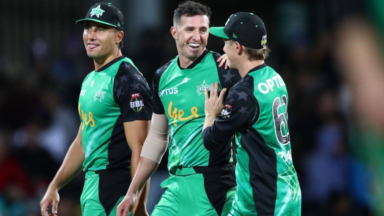 Daniel Worrall celebrates with his team-mates after his fourth wicket of the match, Hobart Hurricanes v Melbourne Stars, BBL 2018-19, Hobart, February 14, 2019