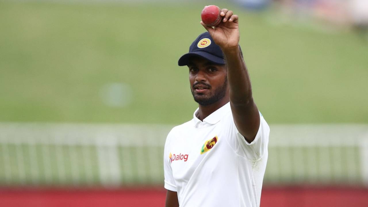 Lasith Embuldeniya celebrates his five-wicket haul&nbsp;&nbsp;&bull;&nbsp;&nbsp;AFP
