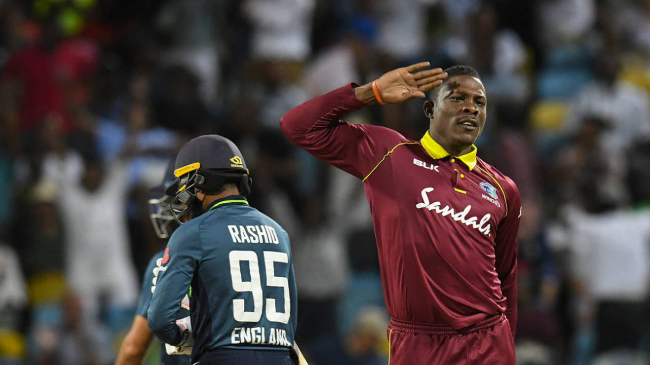Sheldon Cottrell celebrates the dismissal of Adil Rashid during the 2nd ODI between West Indies and England&nbsp;&nbsp;&bull;&nbsp;&nbsp;AFP
