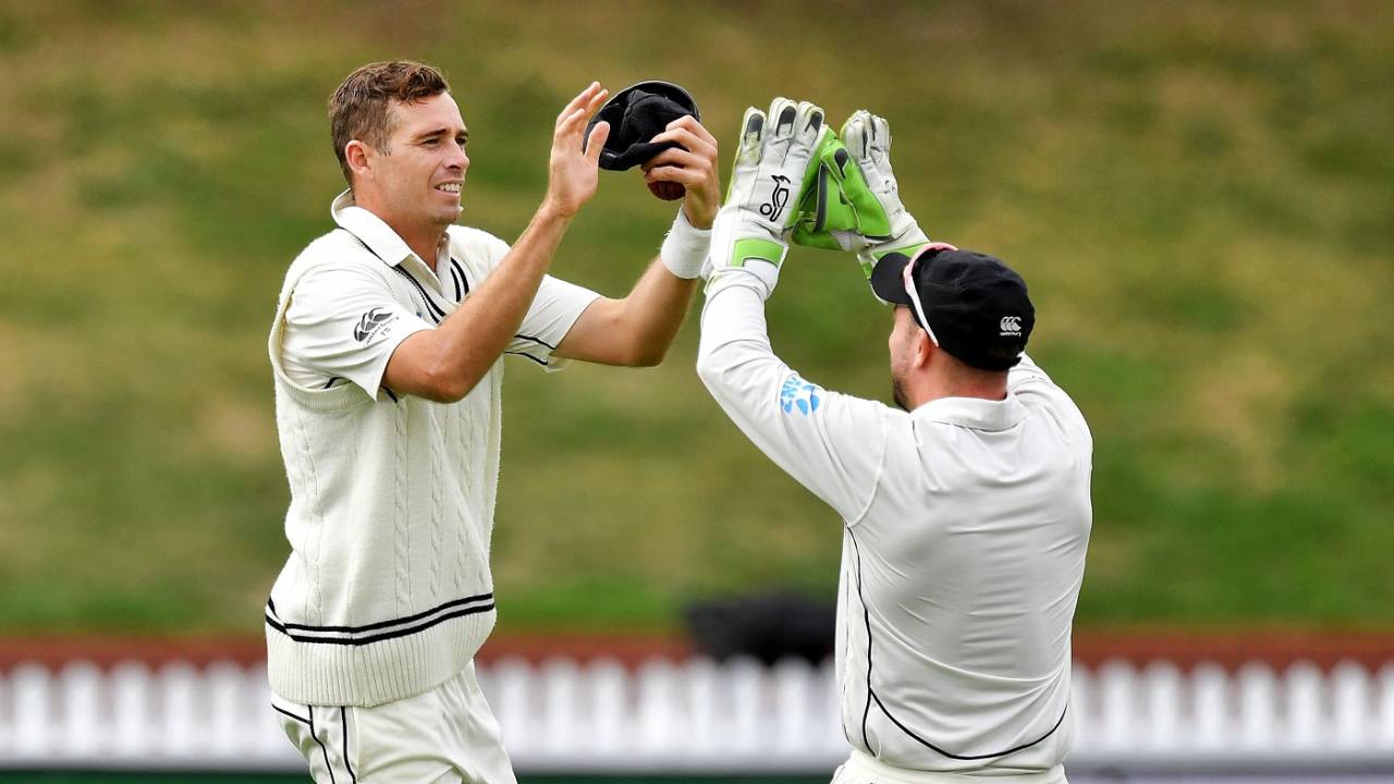 Tim Southee celebrates a wicket with Peter Bocock