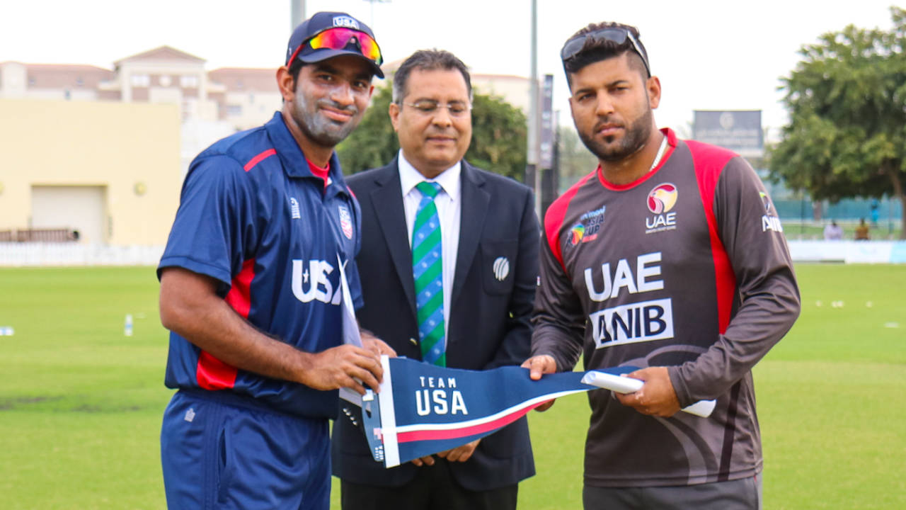 USA captain Saurabh Netravalkar presents a Team USA flag at the toss for USA's maiden T20I, UAE v USA, 1st T20I, Dubai, March 15, 2019