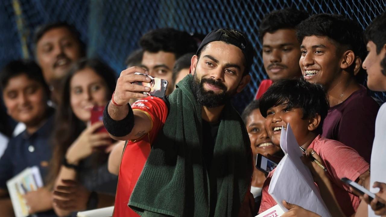 Virat Kohli with his fans during an RCB training session in Chennai ahead of the IPL 2019 opener