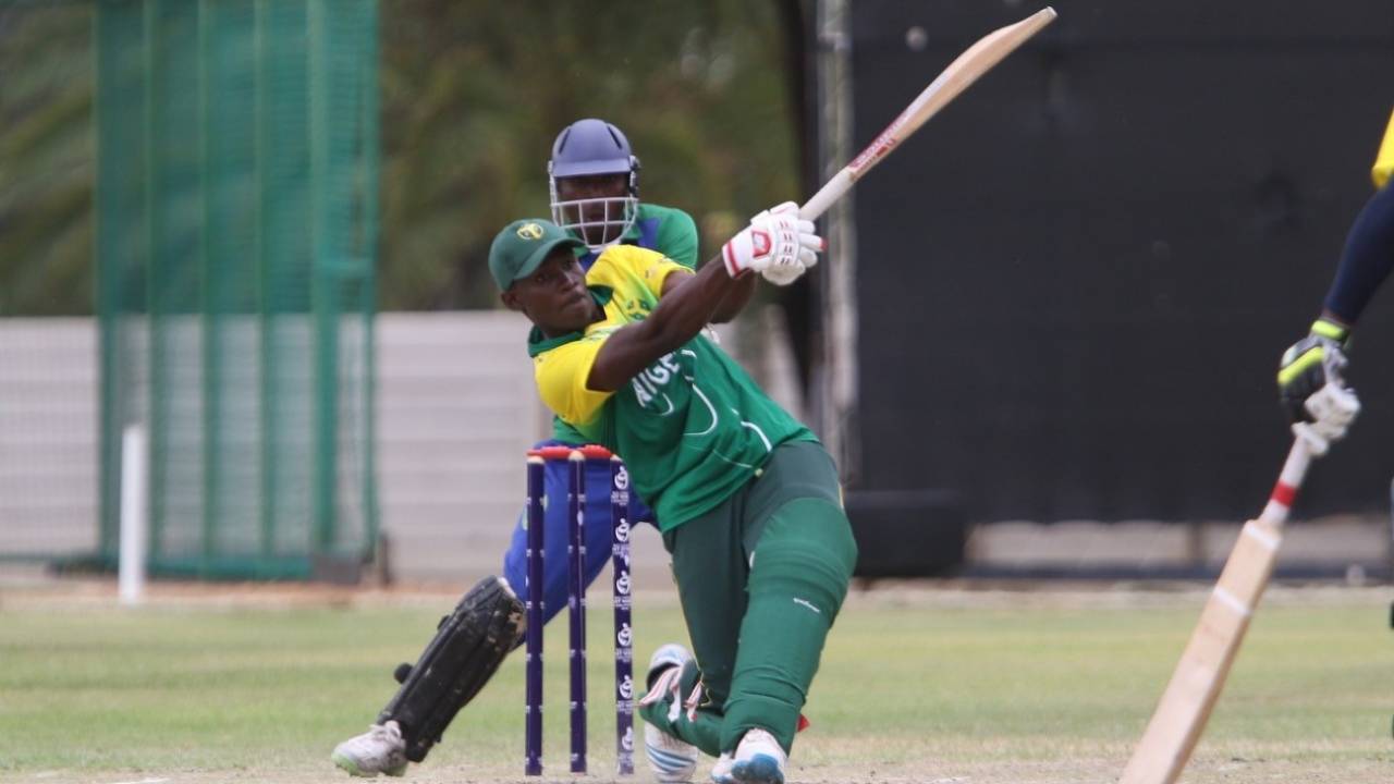 Peter Aho smashes one to midwicket