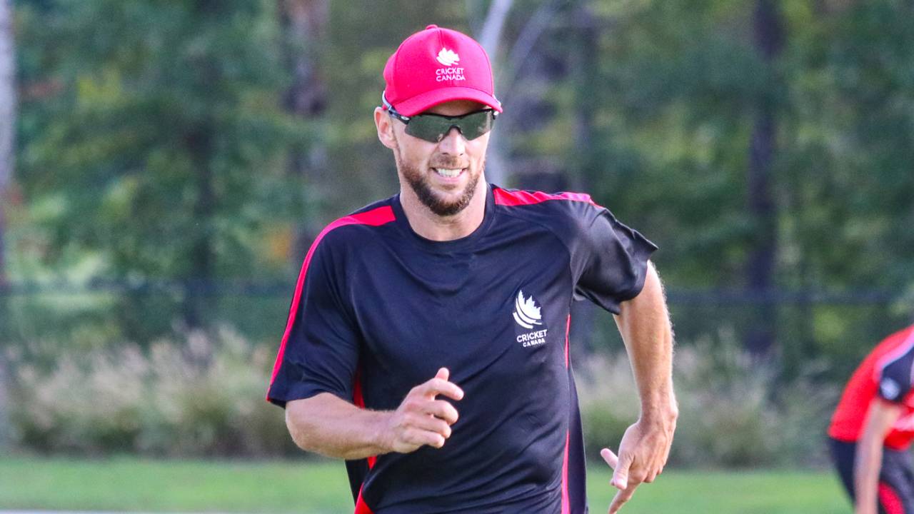 Davy Jacobs goes through a warm-up sprint in a Canada training session