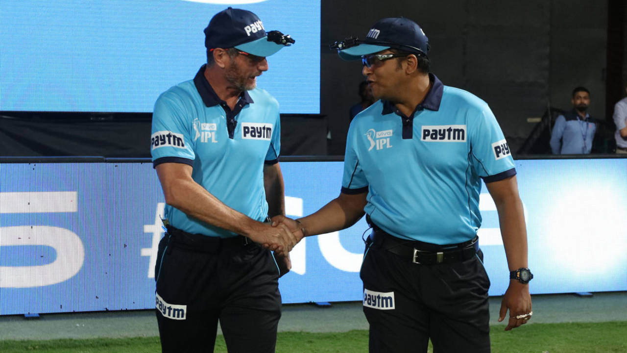 Rod Tucker and Vineet Kulkarni walk out onto the field, Royal Challengers Bangalore v Chennai Super Kings, IPL 2019, Bengaluru, April 21, 2019