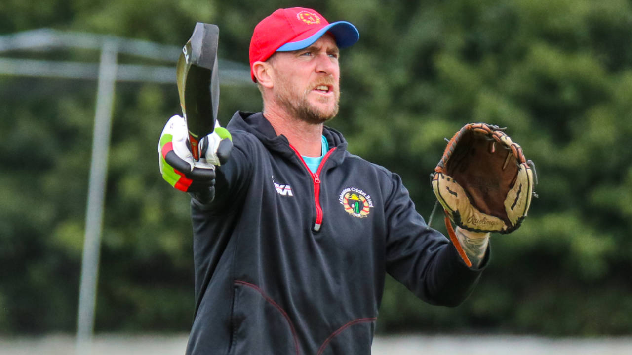 Fielding coach John Mooney directs the squad during an Afghanistan training session, Edinburgh, May 7, 2019