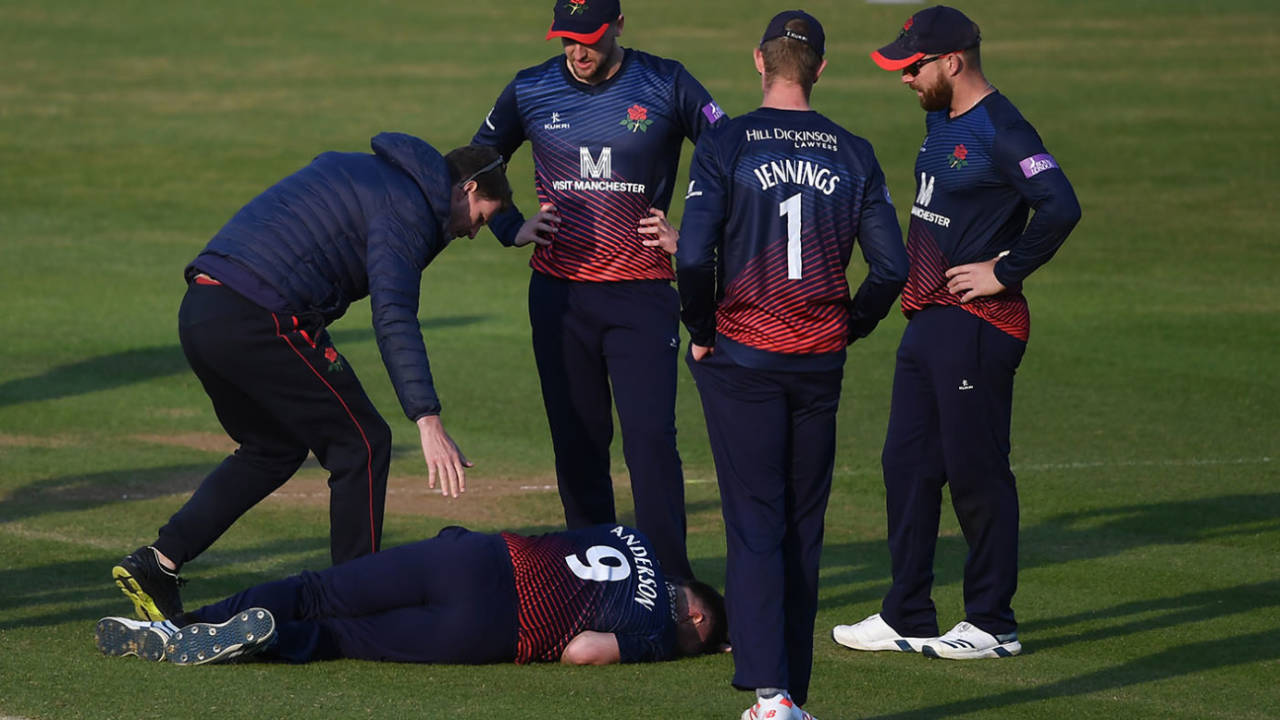 James Anderson lies on the ground after being struck on the knee with a ball hit by James Fuller, Nottinghamshire v Somerset, Royal London One Day Cup semi-final, Trent Bridge, May 12, 2019