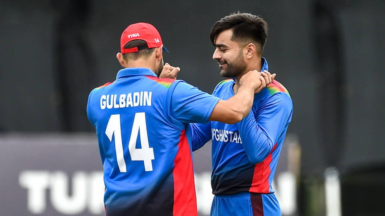 Rashid Khan is congratulated by Gulbadin Naib after taking a wicket&nbsp;&nbsp;&bull;&nbsp;&nbsp;Sportsfile via Getty Images
