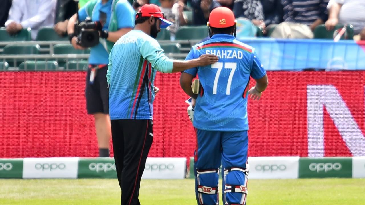 Mohammad Shahzad walks off after injuring his knee, Afghanistan v Pakistan, ICC World Cup warm-up, Bristol, May 24, 2019