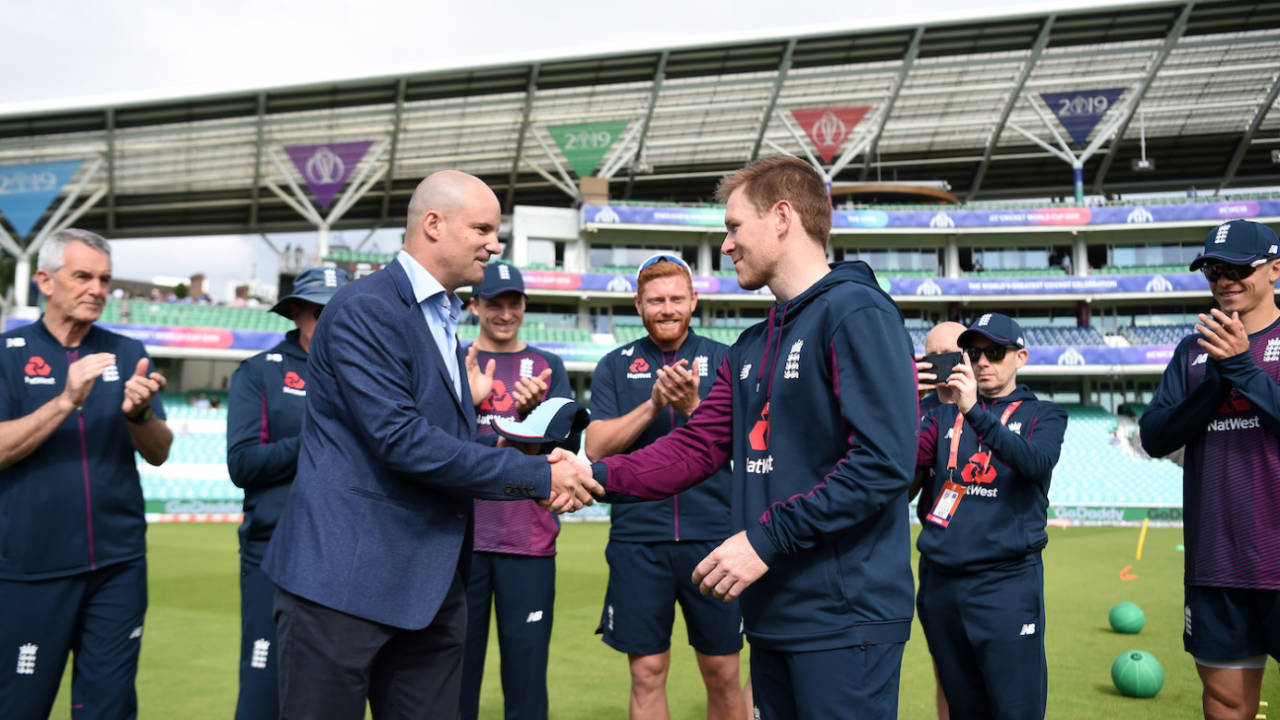 Eoin Morgan is presented his 200th ODI cap for England by Andrew Strauss&nbsp;&nbsp;&bull;&nbsp;&nbsp;IDI via Getty Images