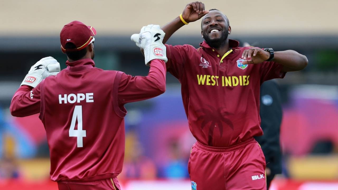 Andre Russell celebrates with Shai Hope&nbsp;&nbsp;&bull;&nbsp;&nbsp;Getty Images