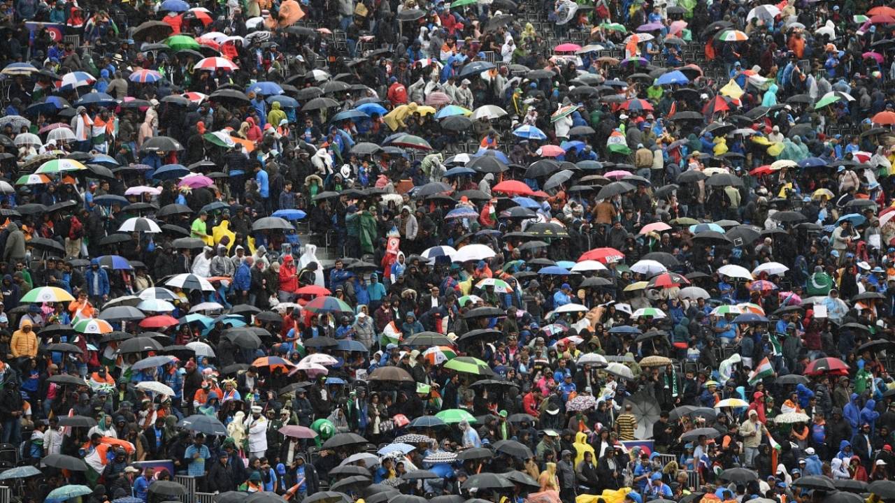 Umbrellas come out as rain stops play, India v Pakistan, World Cup 2019, Old Trafford, June 16, 2019 