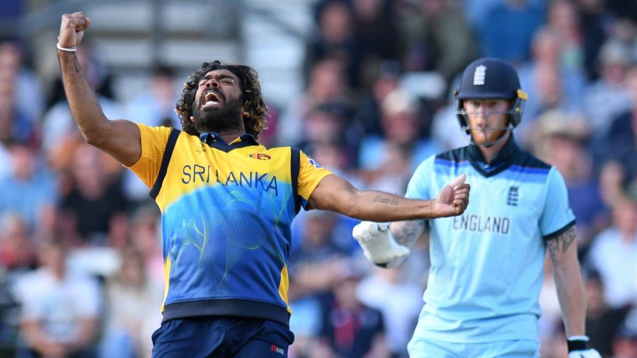 Lasith Malinga celebrates the wicket of Jos Buttler as Ben Stokes looks on, England v Sri Lanka, World Cup 2019, Headingley, June 21, 2019
