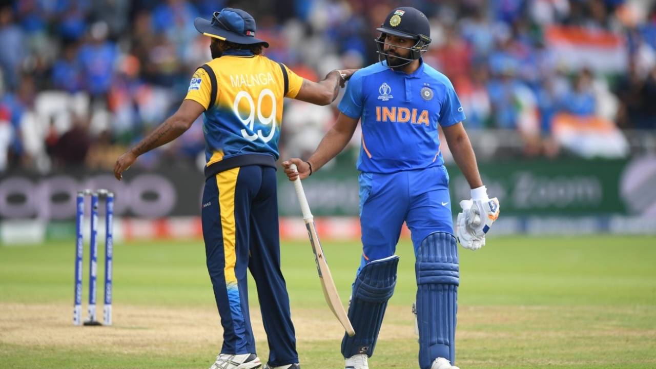Rohit Sharma is given a pat on the back by Lasith Malinga as he walks back to the pavilion, India v Sri Lanka, World Cup 2019, Leeds, July 6, 2019