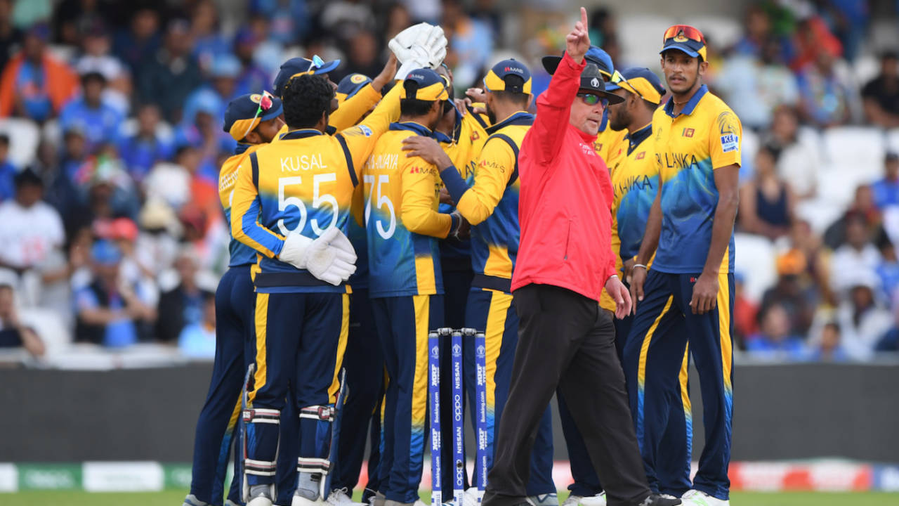 Umpire Ian Gould raises his finger one final time, India v Sri Lanka, World Cup 2019, Leeds, July 6, 2019