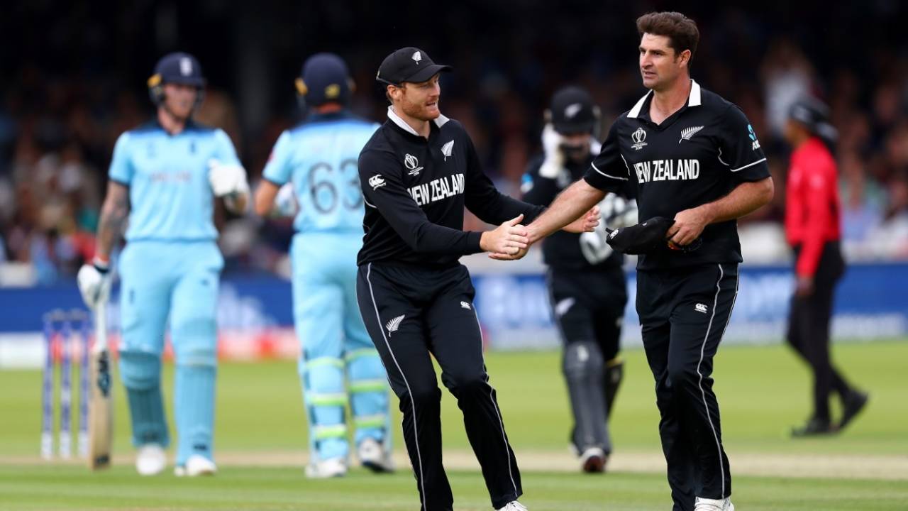 Martin Guptill congratulates Colin de Grandhomme for his spell of 1/25 in 10, England v New Zealand, World Cup 2019, Lord's, July 14, 2019