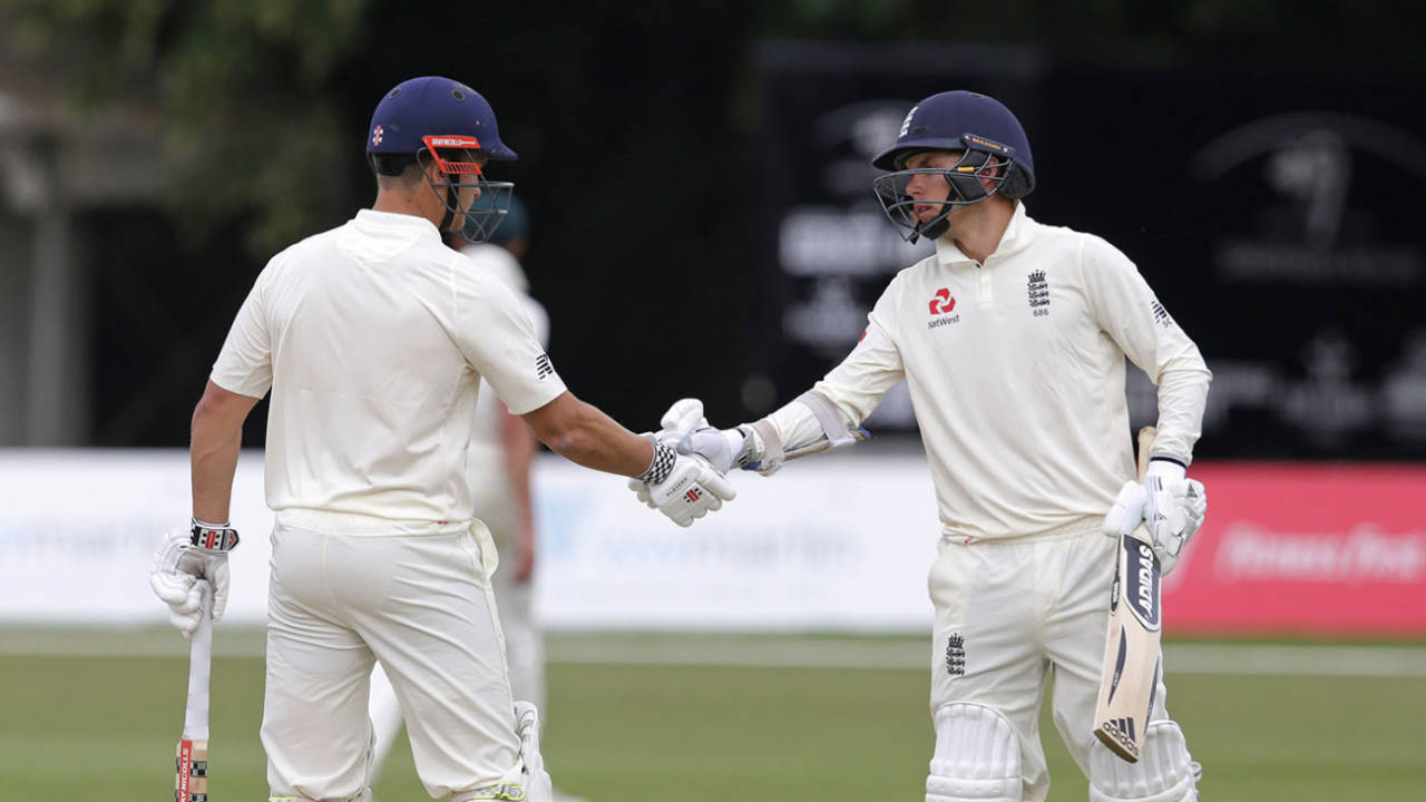 Sam Hain of England Lions is congratulated for his fifty by Sam Curran (right)&nbsp;&nbsp;&bull;&nbsp;&nbsp;Getty Images