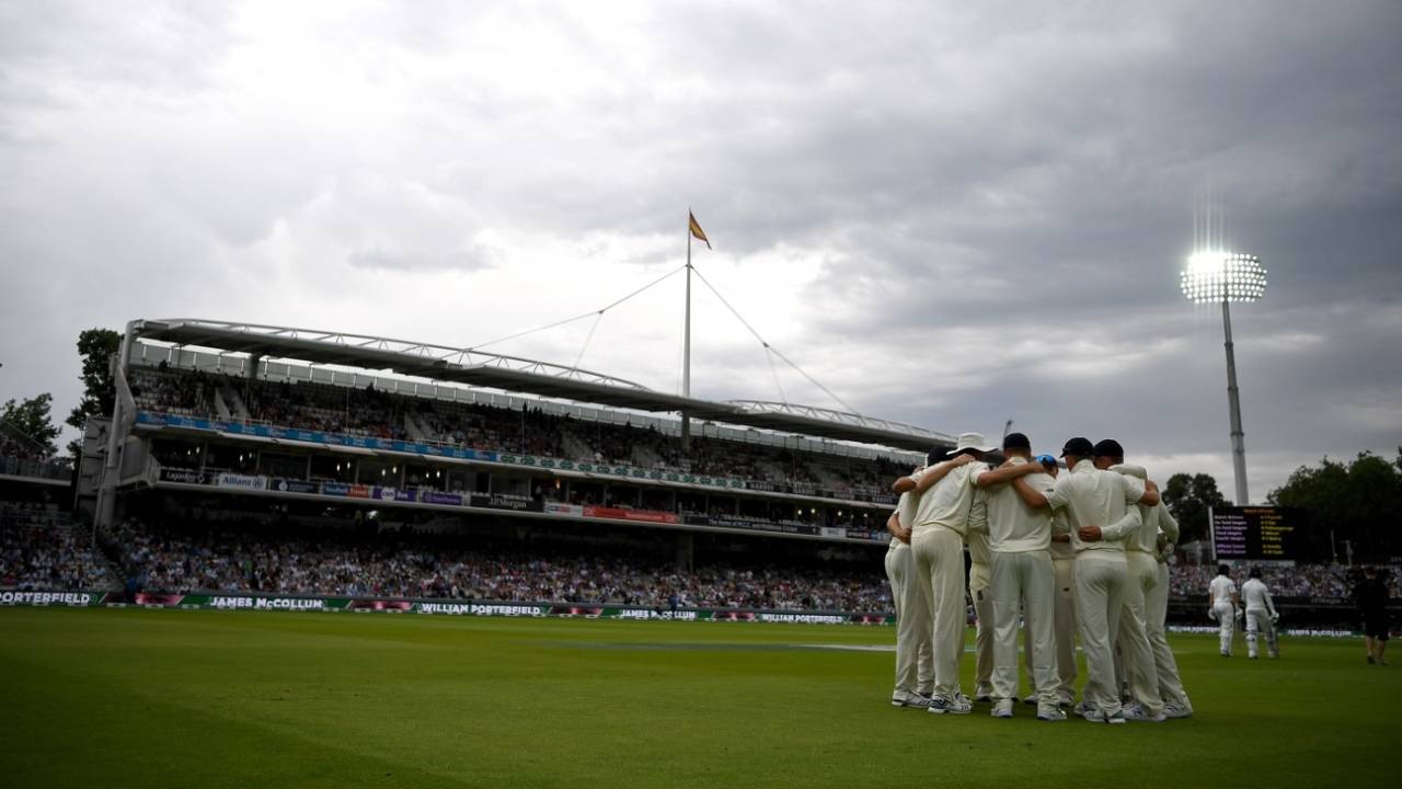 England get together in a team huddle under a gloomy sky&nbsp;&nbsp;&bull;&nbsp;&nbsp;Getty Images
