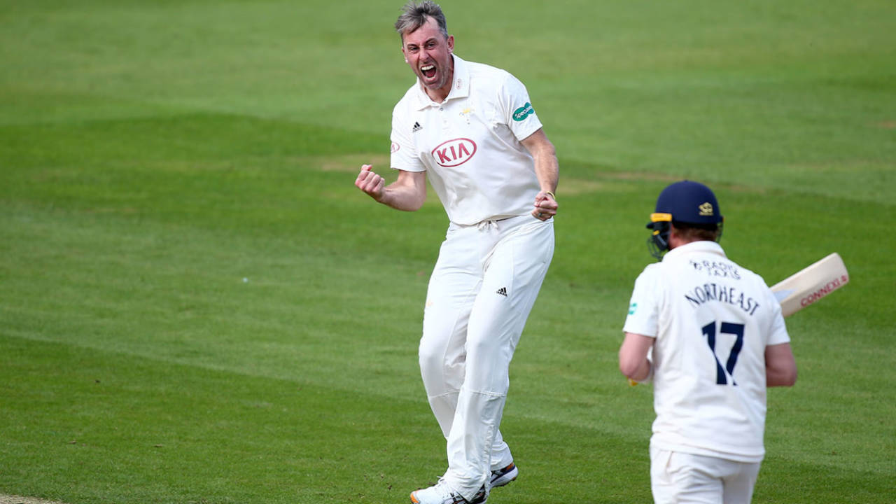Rikki Clarke celebrates the wicket of Sam Northeast on the way to his seven-for, Surrey v Hampshire, County Championship, The Oval, August 19, 2019