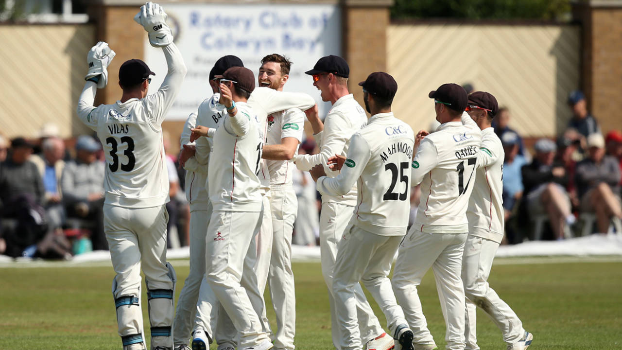 Richard Gleeson is mobbed by his team-mates, Glamorgan v Lancashire, County Championship, Division Two, Colwyn Bay, August 20, 2019