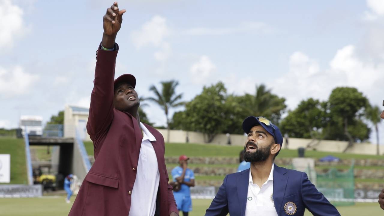Jason Holder tosses the coin as Virat Kohli looks on, West Indies v India, 1st Test, North Sound, 1st day, August 22, 2019