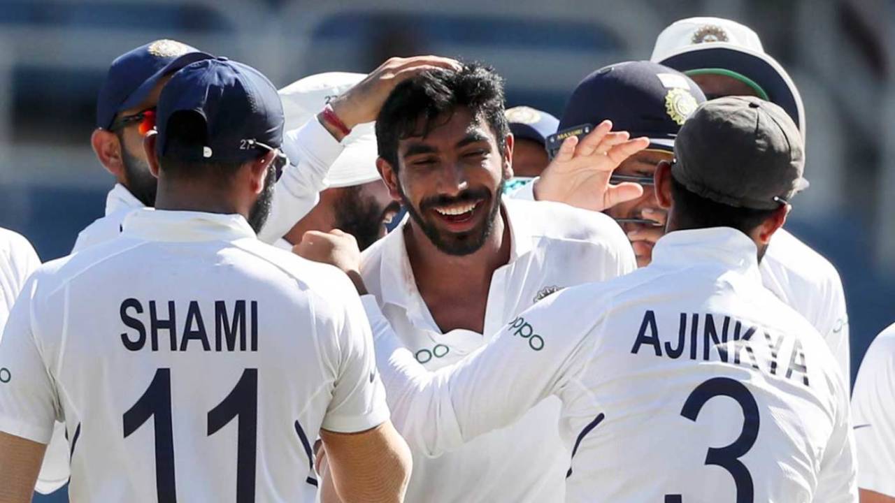 Jasprit Bumrah is swarmed by team-mates after completing a hat-trick&nbsp;&nbsp;&bull;&nbsp;&nbsp;Associated Press
