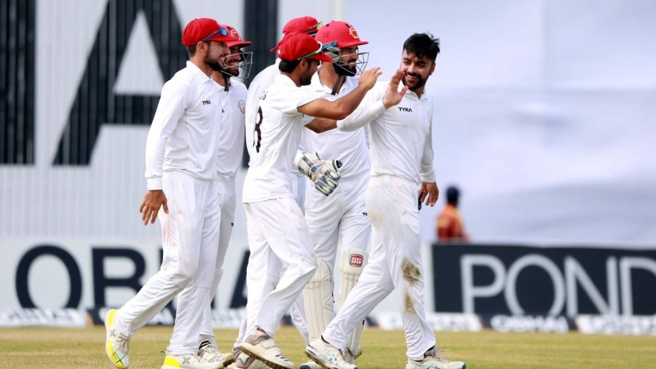 Rashid Khan celebrates a wicket with his team-mates, Bangladesh v Afghanistan, Only Test, Chattogram, 2nd day, September 6, 2019