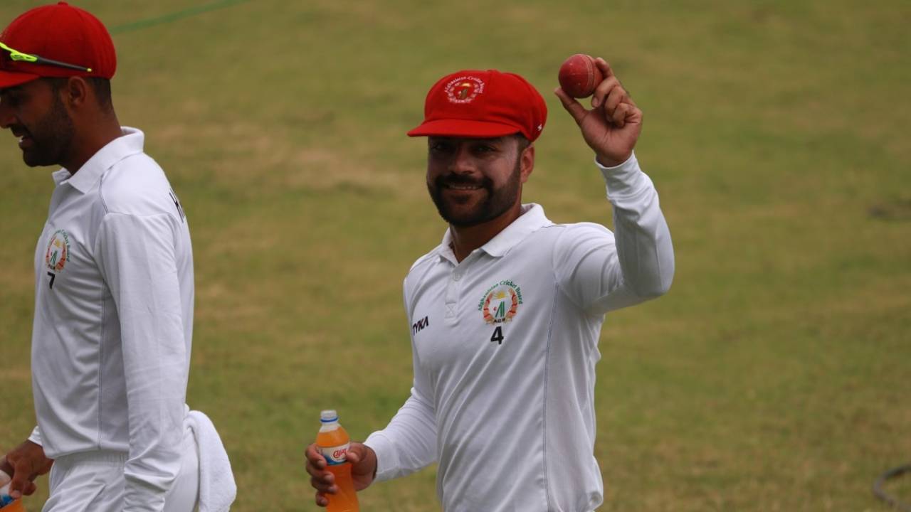 Rashid Khan shows off the match ball after returning a five-for, Bangladesh v Afghanistan, Only Test, Chattogram, 3rd day, September 7, 2019