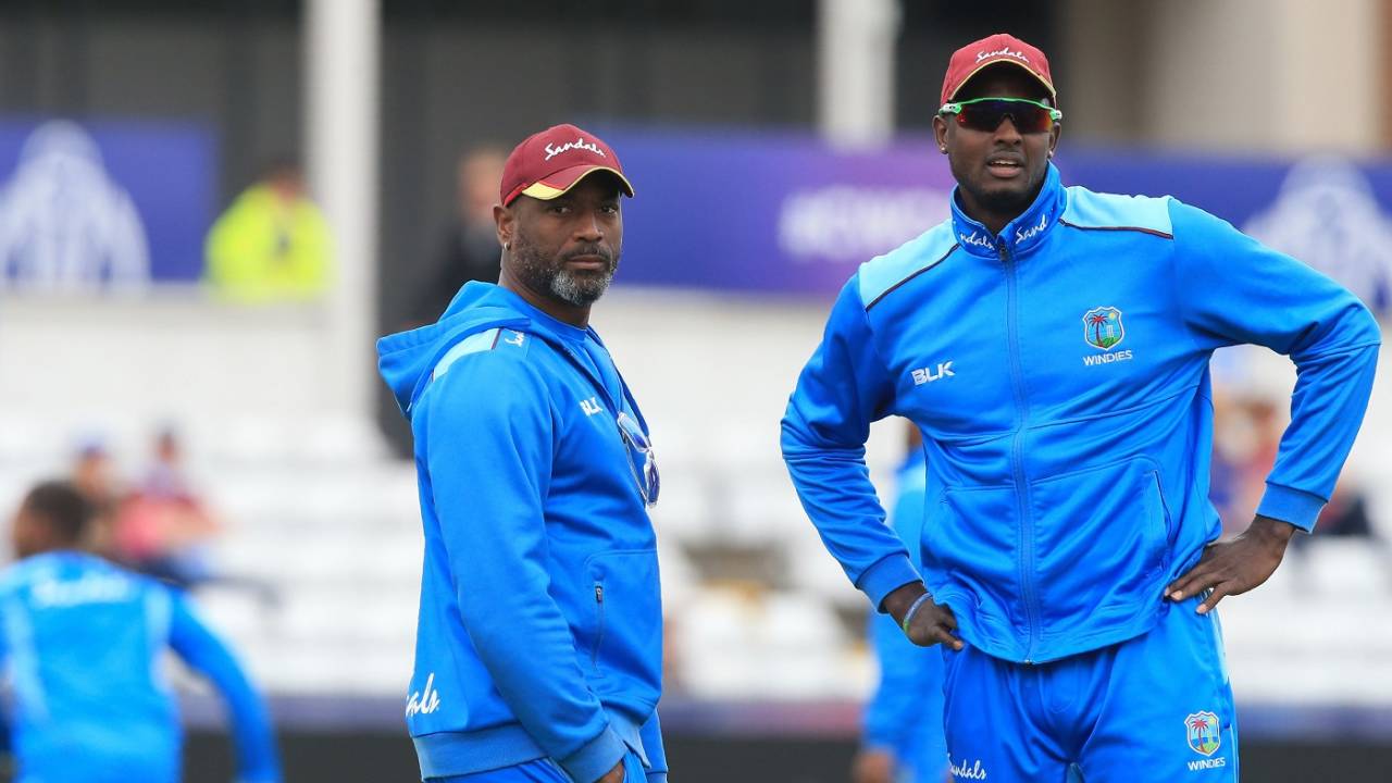 Floyd Reifer and Jason Holder during a practice session