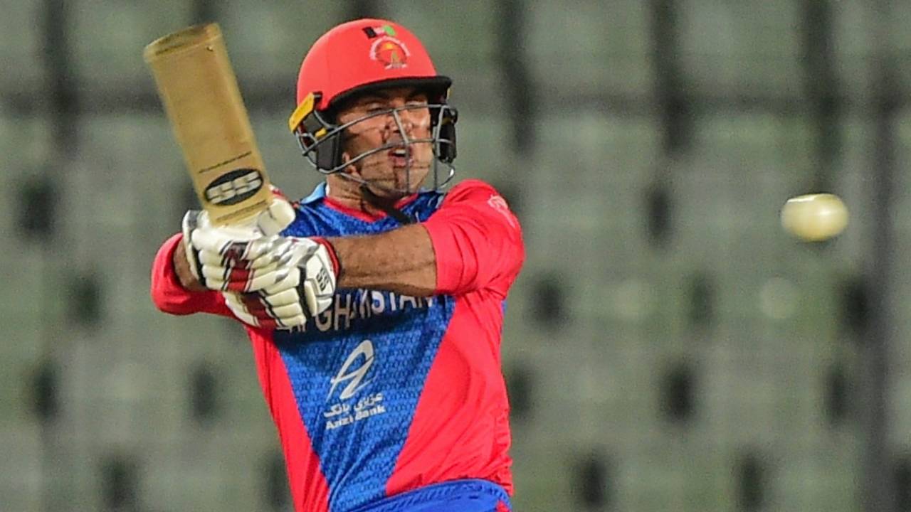 Mohammad Nabi unleashes a pull shot during his whirlwind knock&nbsp;&nbsp;&bull;&nbsp;&nbsp;Getty Images