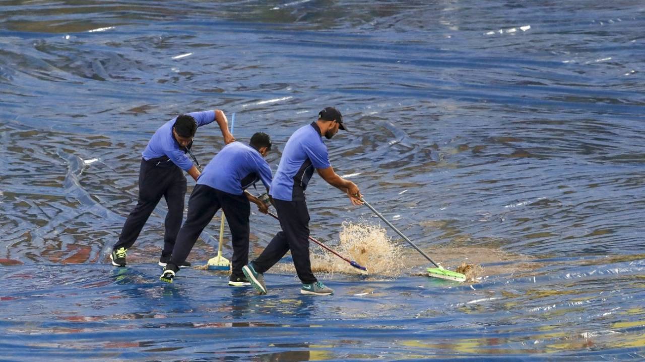 The groundstaff work on the covers, India v South Africa, 1st T20I, Dharamsala, September 15, 2019